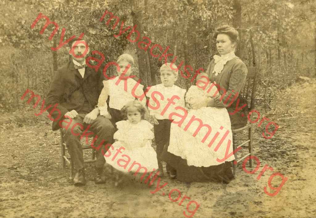 Leila Dell Wright with husband Walter Henry Backus and 4 of their 6 children. Assuming the children are, in birth order, Gerald, Eldridge, Christine, and Elizabeth